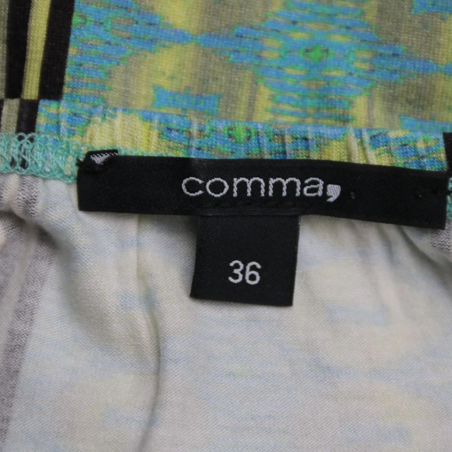 топ Comma,